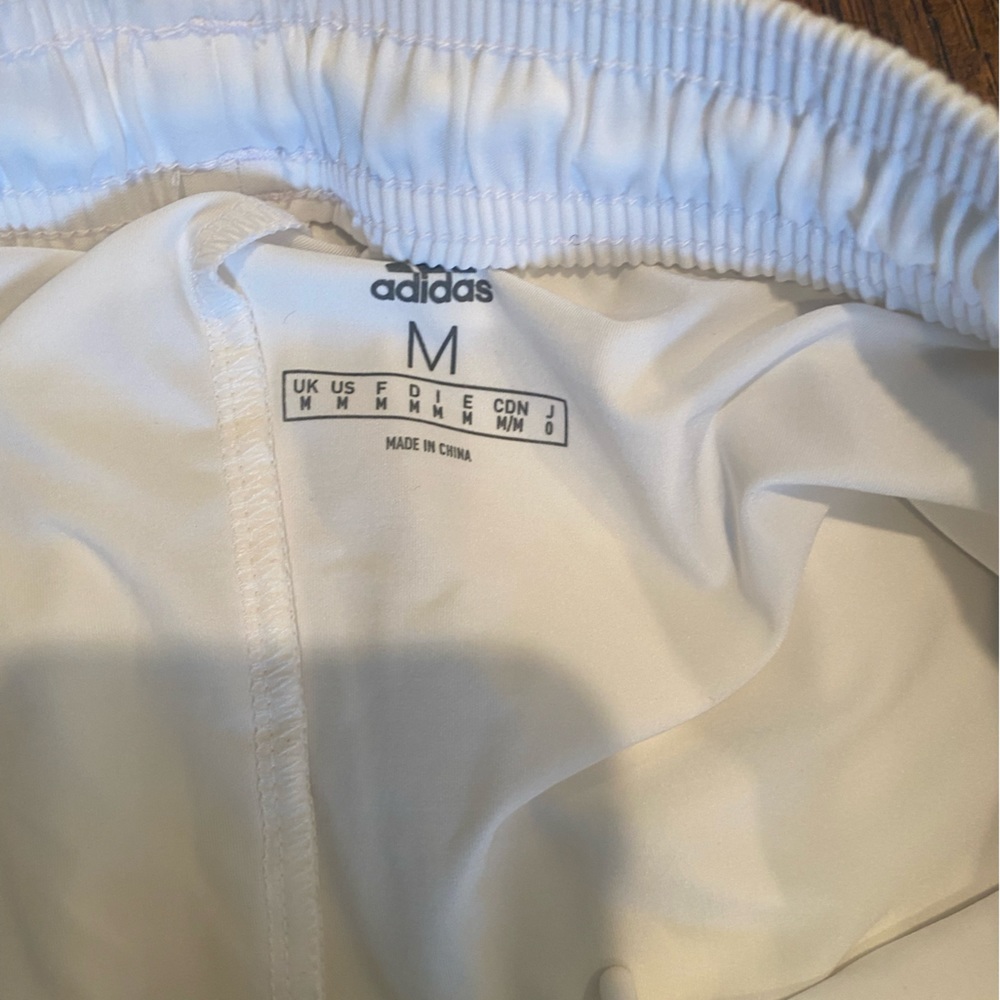 Men’s Adidas Performance tights under shorts. Size medium. Gently worn